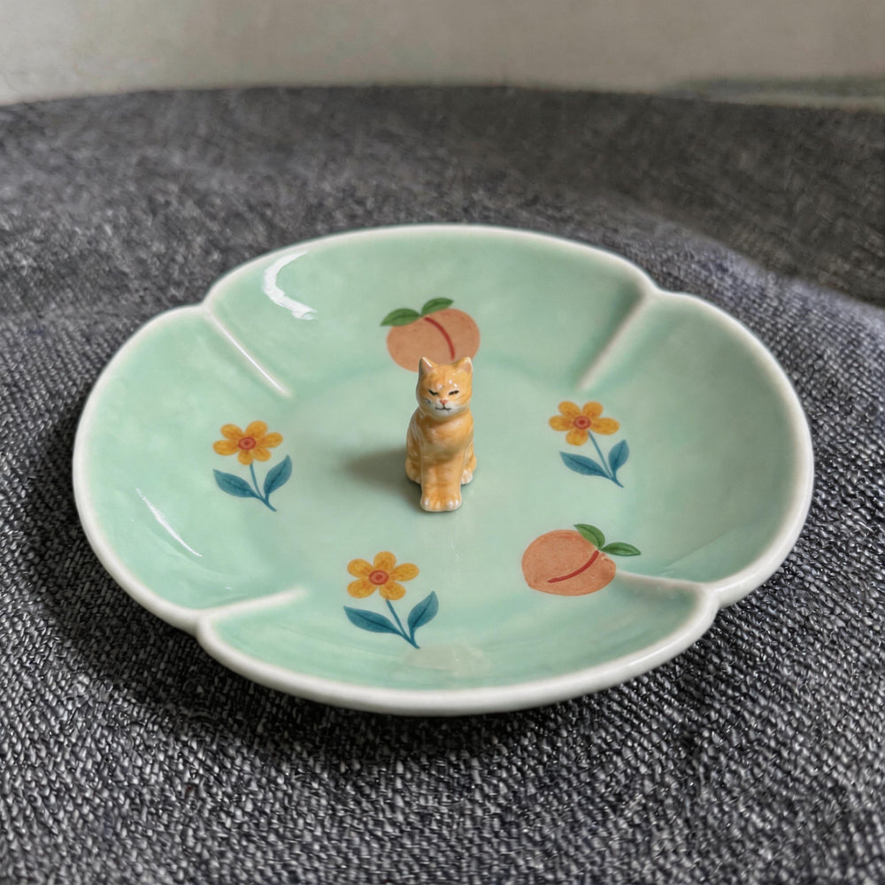 Teal cat on a lotus pet ring dish view 1