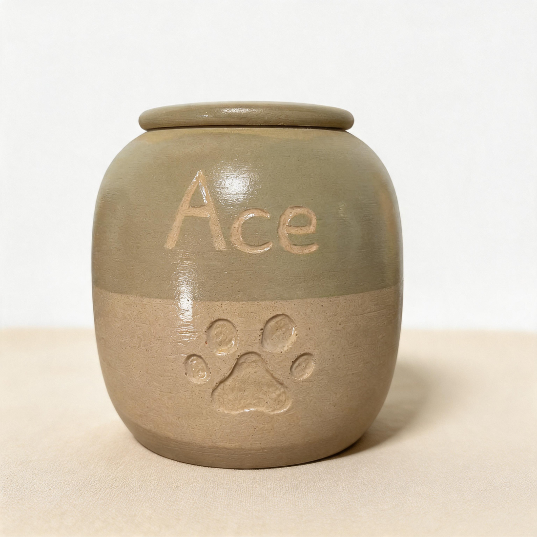 Green grey two tone handmade ceramic pet urn, a long-lasting eco friendly pet memorial keepsake by Farbe Ceramics