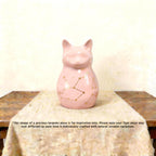 Three-quarter view of a cat-shaped urn for human ashes — a handmade ceramic cat lover cremation urn, hand-painted and personalized, made to order from keepsake to full sizes by Farbe Ceramics.