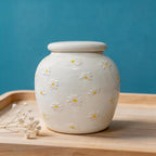 Side profile of a personalized custom pet portrait urn for ashes — a handmade ceramic pet memorial urn, hand-painted from your photos to match your pet and made to order. Custom pet memorial by Farbe Ceramics.