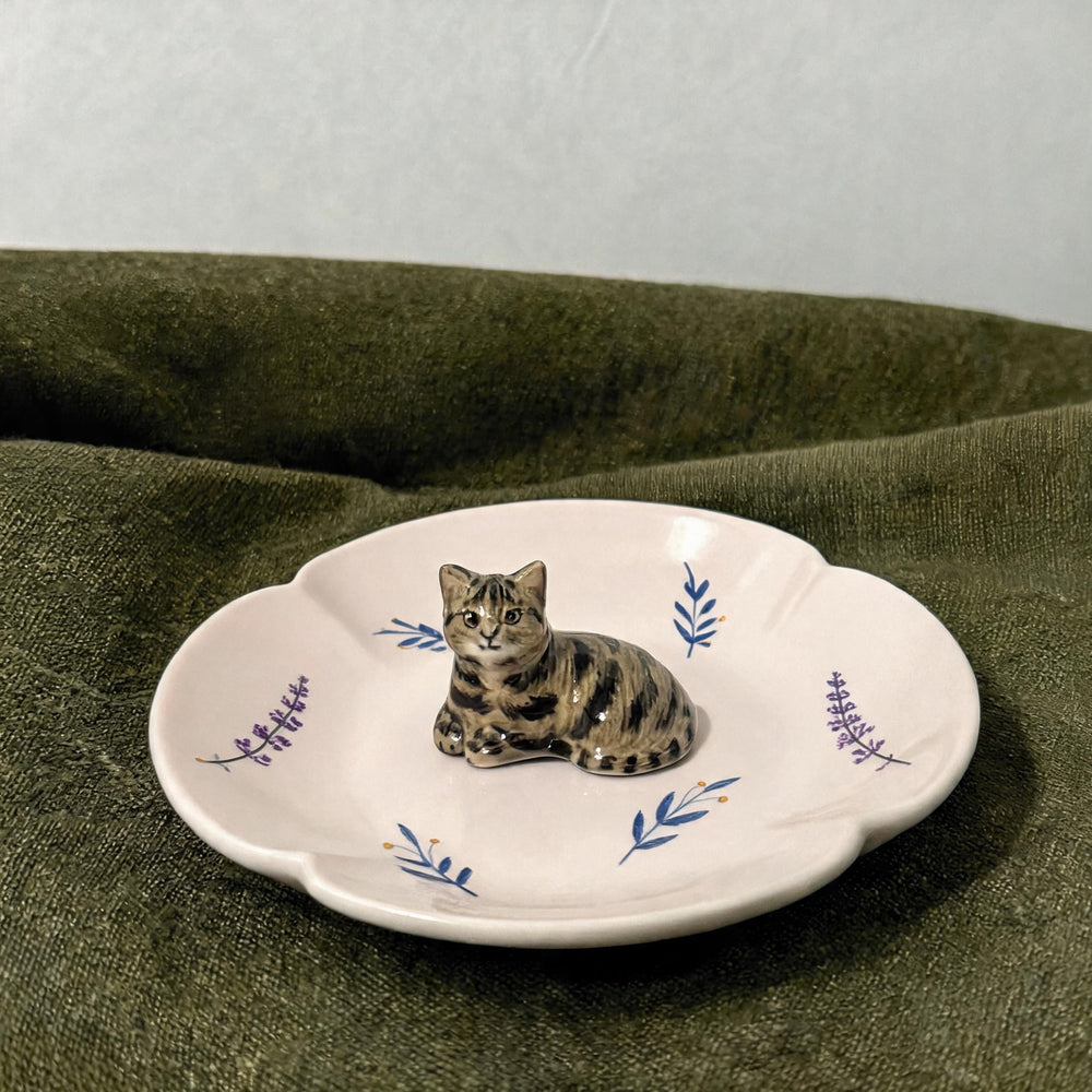 Light pink cat on a lotus pet ring dish view 1