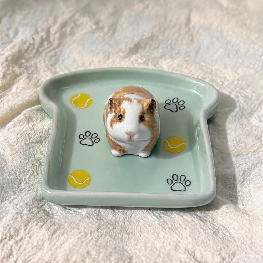 Green hamster on a custom toast pet trinket dish
