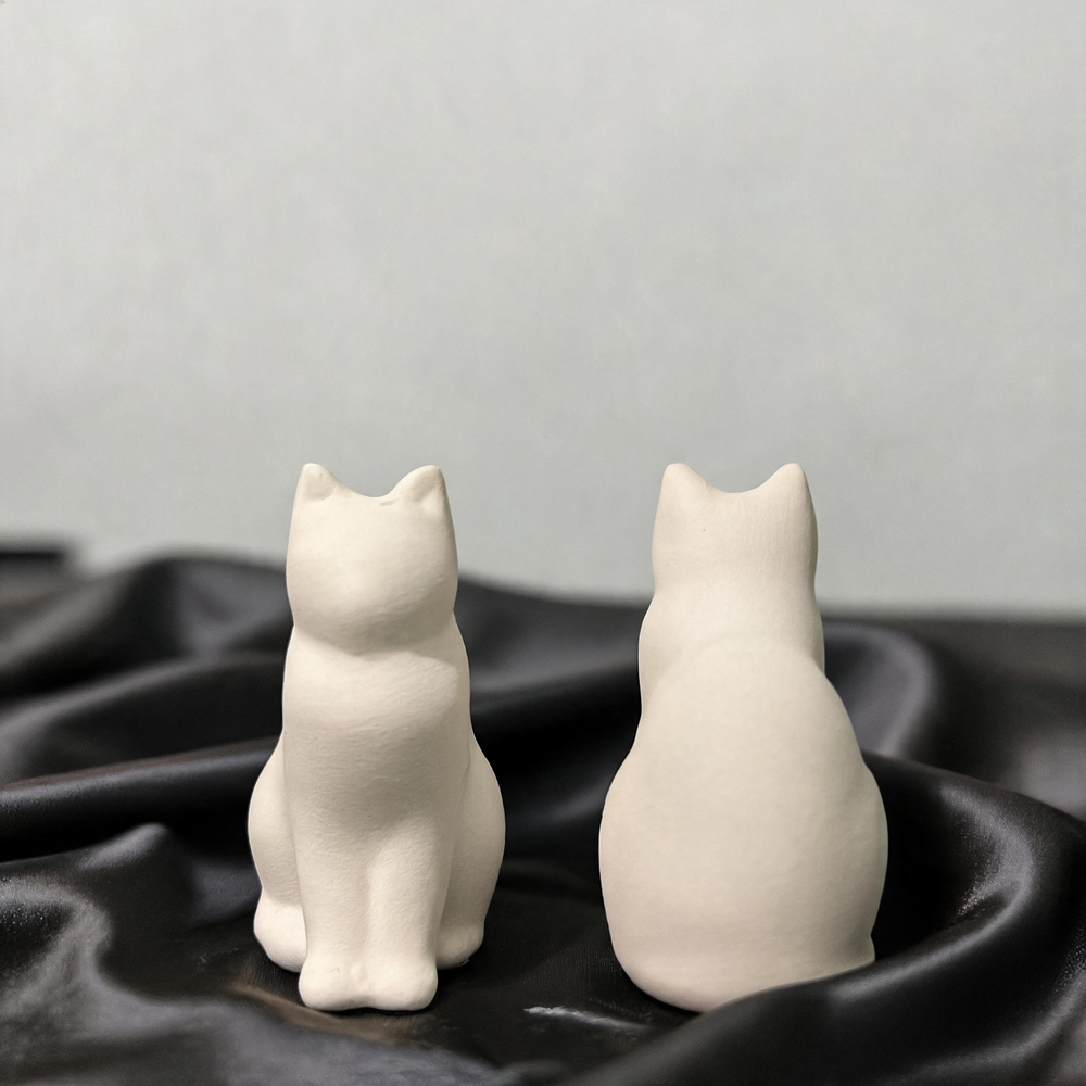 Unpainted straight sitting cat figurine – front and back
